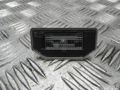 Tesla 1449730-00-B / 144973000B Model Y 2022 Éclairage de plaque d'immatriculation - Image 1