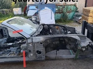 Aston Martin DB7 Volante 2002 ćwiartka samochodowa z przodu po prawej