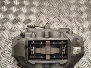 Tesla 1344621-29-B / 134462129B MODEL 3 2025 Zacisk hamulca z przodu z lewej