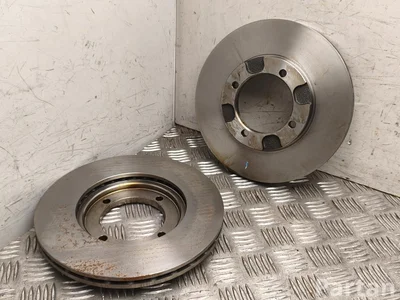 Mitsubishi 24011801091 LANCER IV liftback (C6_A, C7_A) 1994 Tarcza hamulcowa z przodu - Obraz 1