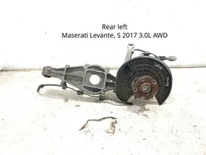 Gebrauchtes Original Maserati HN29057-2 / HN290572 LEVANTE 2017 Hinterer Radlagergehäuse komplett linke Seite