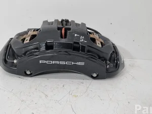 Porsche 9J1615105, 9J1615105AT, 9J1615123124 Taycan Turbo 2022 Тормозной суппорт спереди слева