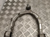 Tesla 1344321-00-A / 134432100A MODEL 3 2025 Przód Wahacz poprzeczny góra lewa strona